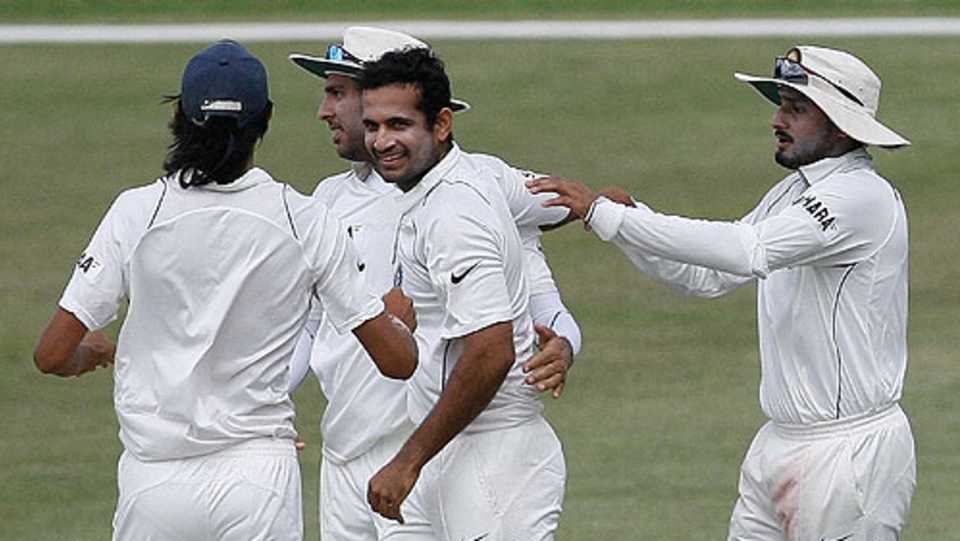 Irfan Pathan is congratulated on a wicket