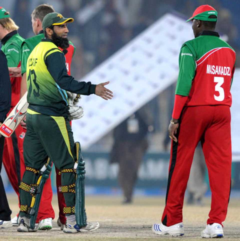 Mohammad Yousuf and Hamilton Masakadza shake hands after the game