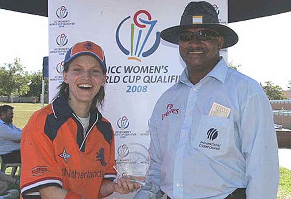 Helmien Rambaldo receives the Man-of-the-Match award for her half-century