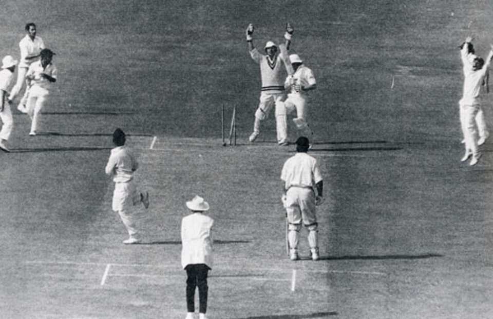 Barry Wood is cleaned up by Bishan Bedi