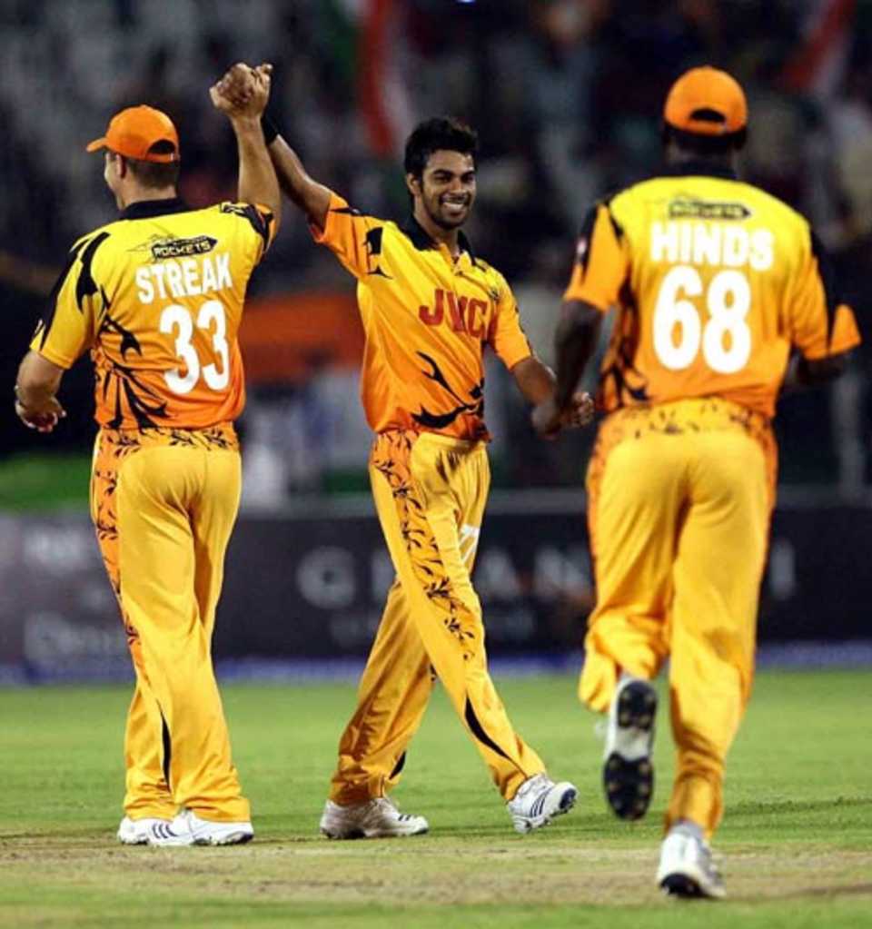 Sumit Kalia celebrates one of his four wickets 