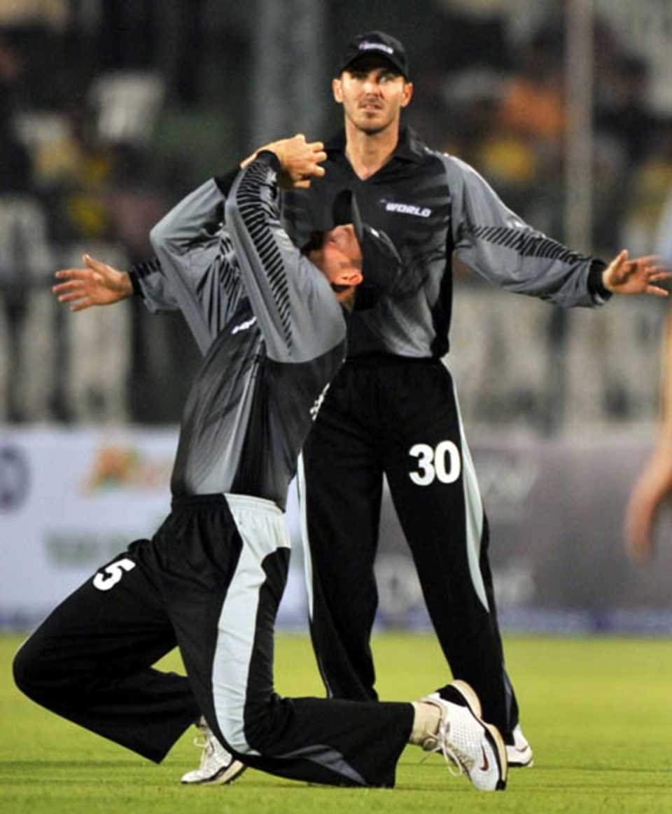 Chris Harris completes a catch as Damien Martyn looks on, India XI v World XI, Indian Cricket League, Hyderabad, April 9, 2008