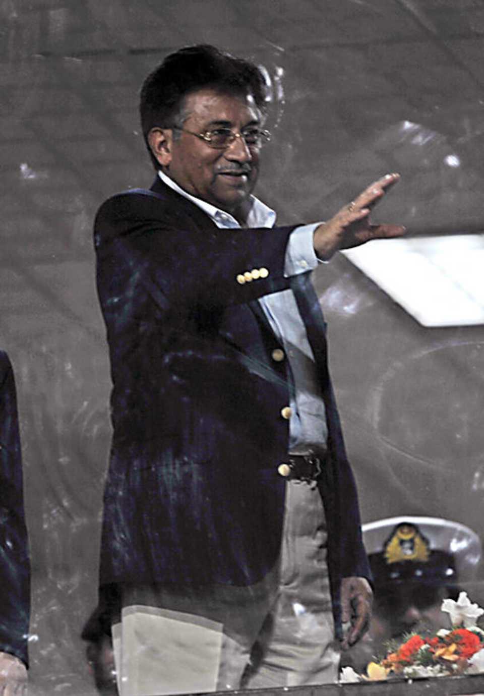 Pakistan president Pervez Musharraf waves to the crowd