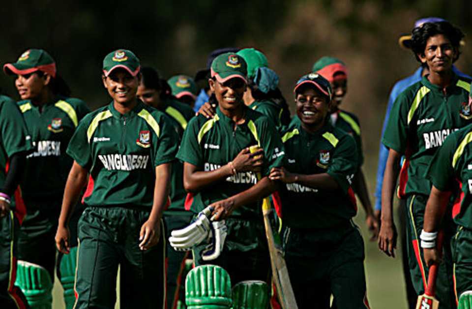 Salma Khatun leads her side off the ground after their win over Pakistan