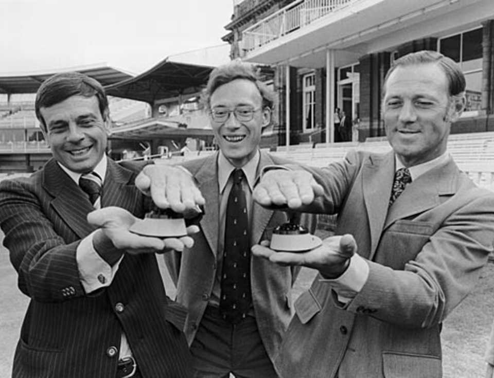 Umpires Dickie Bird and Barry Meyer try out the Weston photometers which they will use to test the light during the Lord's Test against New Zealand. The person in the middle is Patrick Eager, August 23, 1978