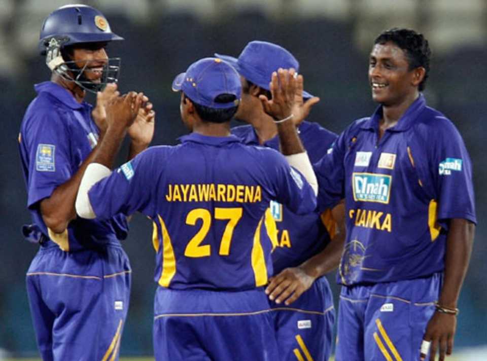 Ajantha Mendis and his team-mates are all smiles after a Bangladesh wicket