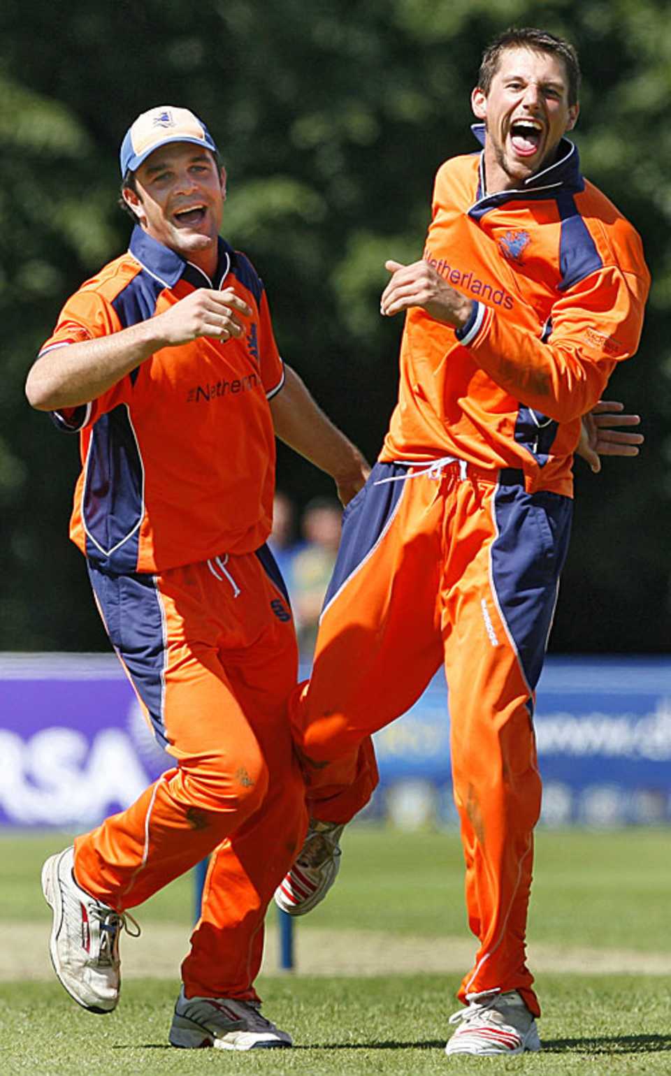 Peter Borren and Pieter Seelaar celebrate another wicket during Netherlands' victory over Kenya