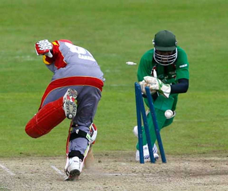 Karun Jethi is run out as Canada struggle