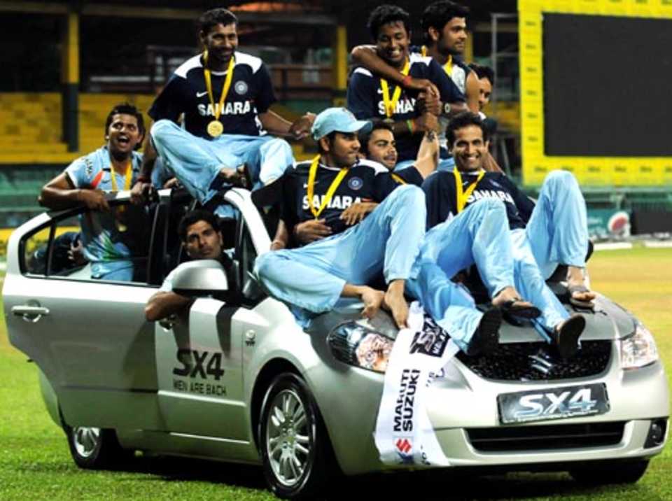 The Indian team take a victory ride