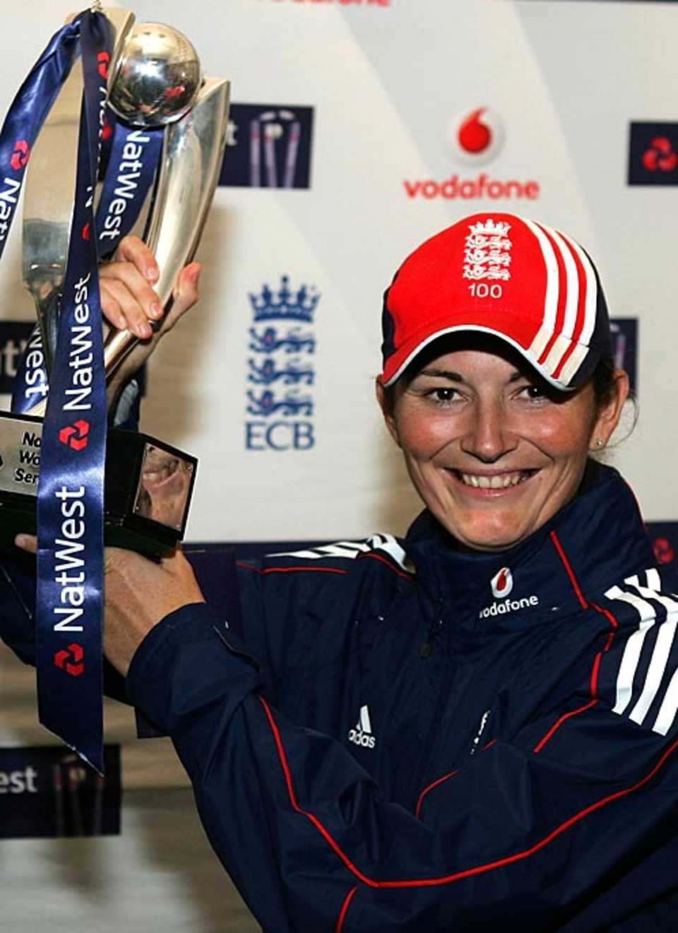 England captain Charlotte Edwards poses with NatWest trophy after winning the five-match ODI series against India 4-0 