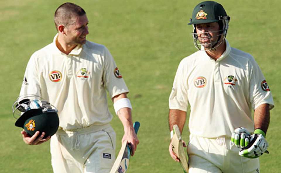 Ricky Ponting and Michael Clarke walk back at the end of the match