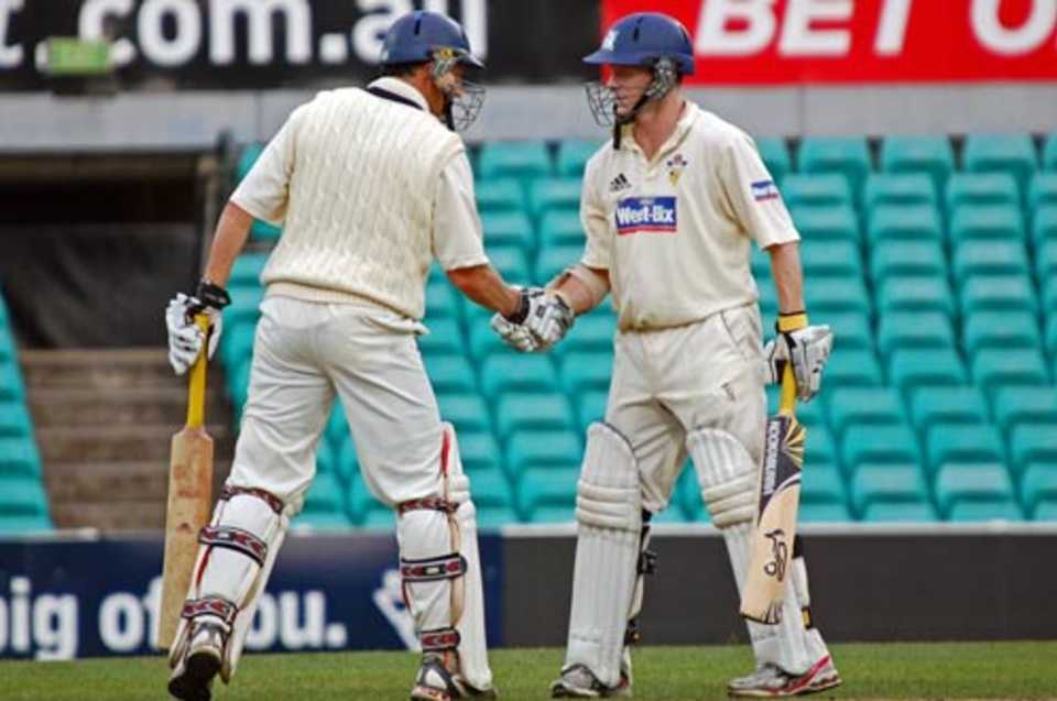David Hussey congratulates Chris Rogers on his 150, New South Wales v Victoria, Sheffield Shield, Sydney, November 5, 2008