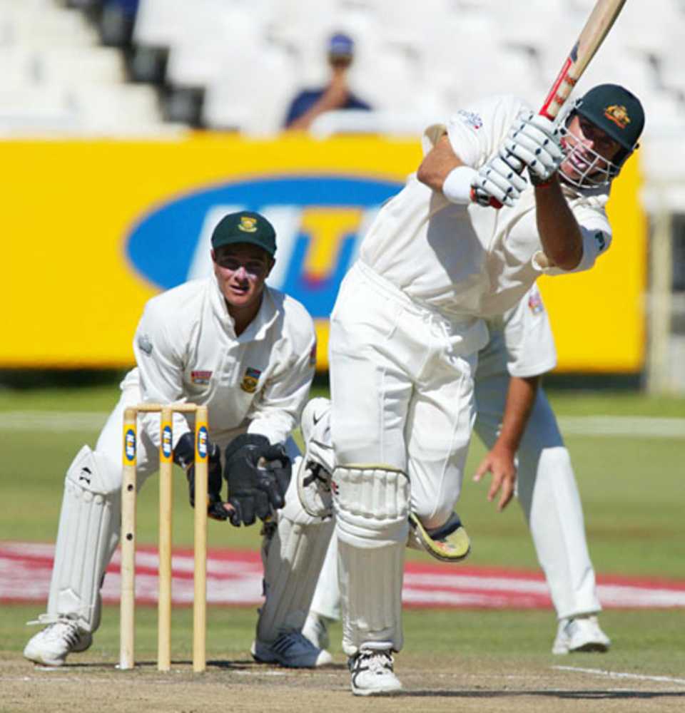 Matthew Hayden lofts the ball over mid-on during his innings of 96, South Africa v Australia, 2nd Test, Cape Town, 5th day, March 12, 2002