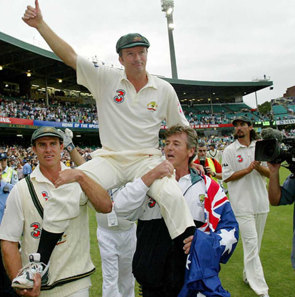 Matthew Hayden carries off Steve Waugh at the end of the Test