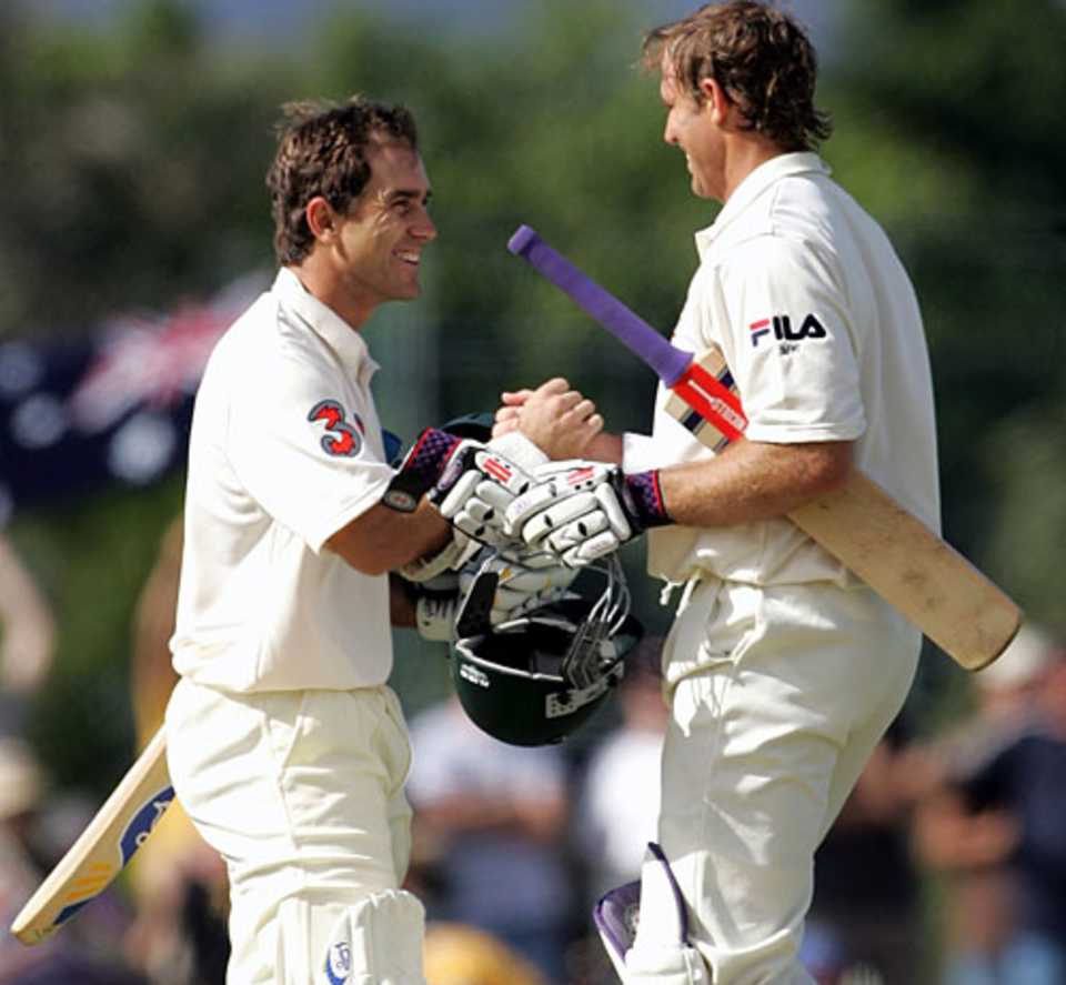 Justin Langer congratulates Matthew Hayden on reaching his century, Australia v Sri Lanka, 2nd Test, Cairns, 1st day, July 9, 2004