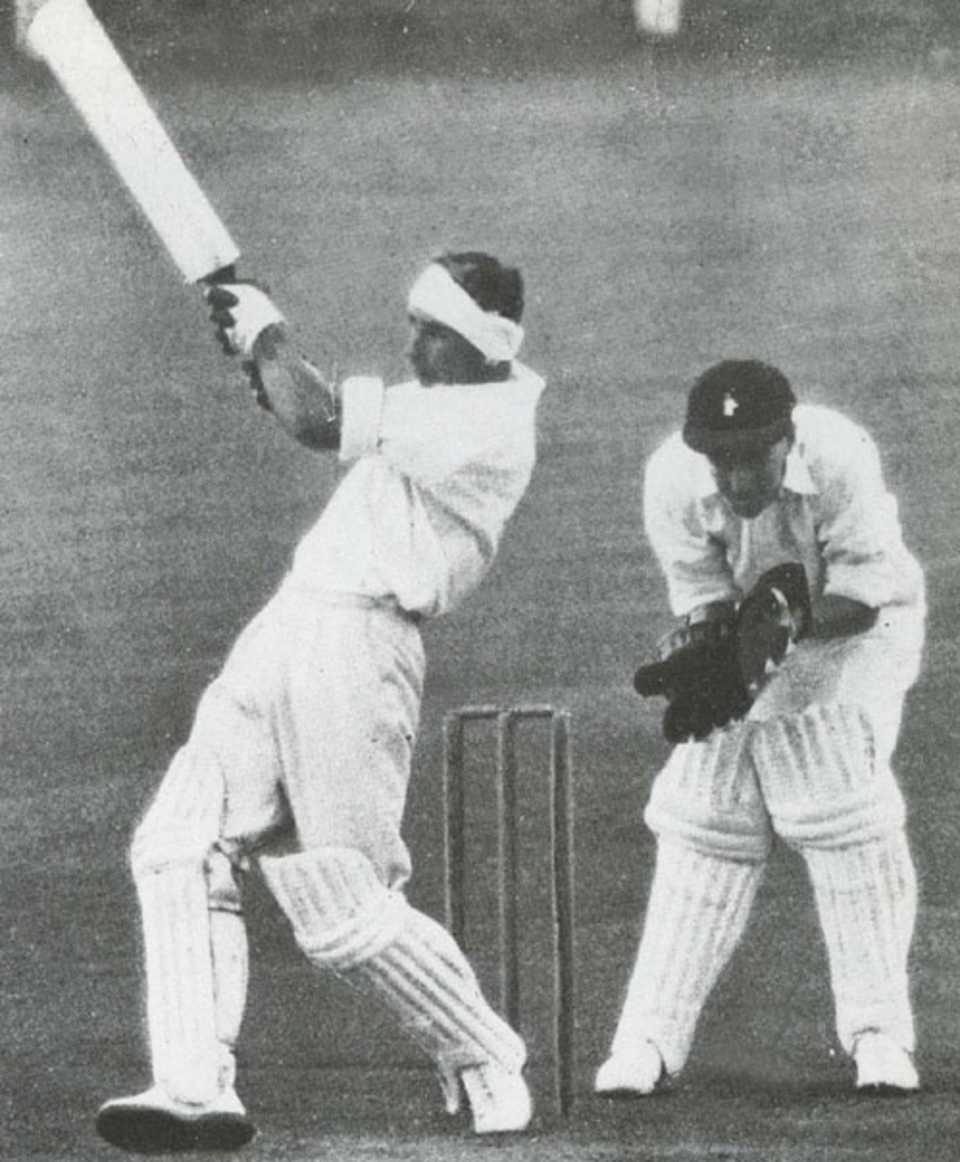 Bert Sutcliffe lofts Hugh Tayfield for a six, one of three in an over, during his brave 80 not out, South Africa v New Zealand, 2nd Test, Johannesburg, December 26, 1953