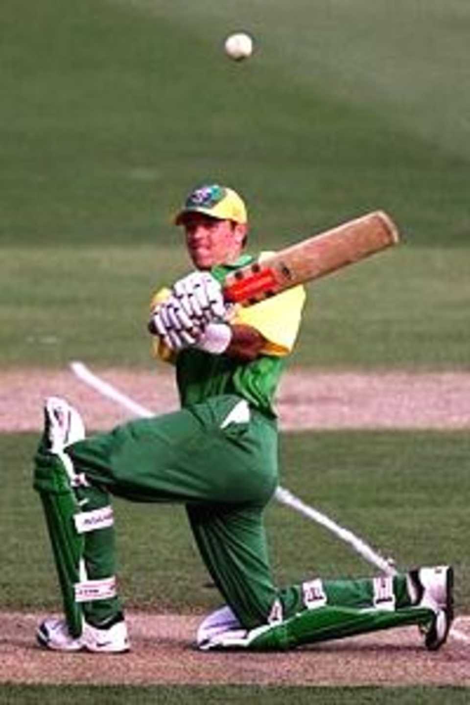12 Jan 2001: Greg Blewett of Australia hits over mid wicket during his innings of 131 during the limited over game between Australia A and Zimbabwe at The Gabba cricket ground, Brisbane, Australia.