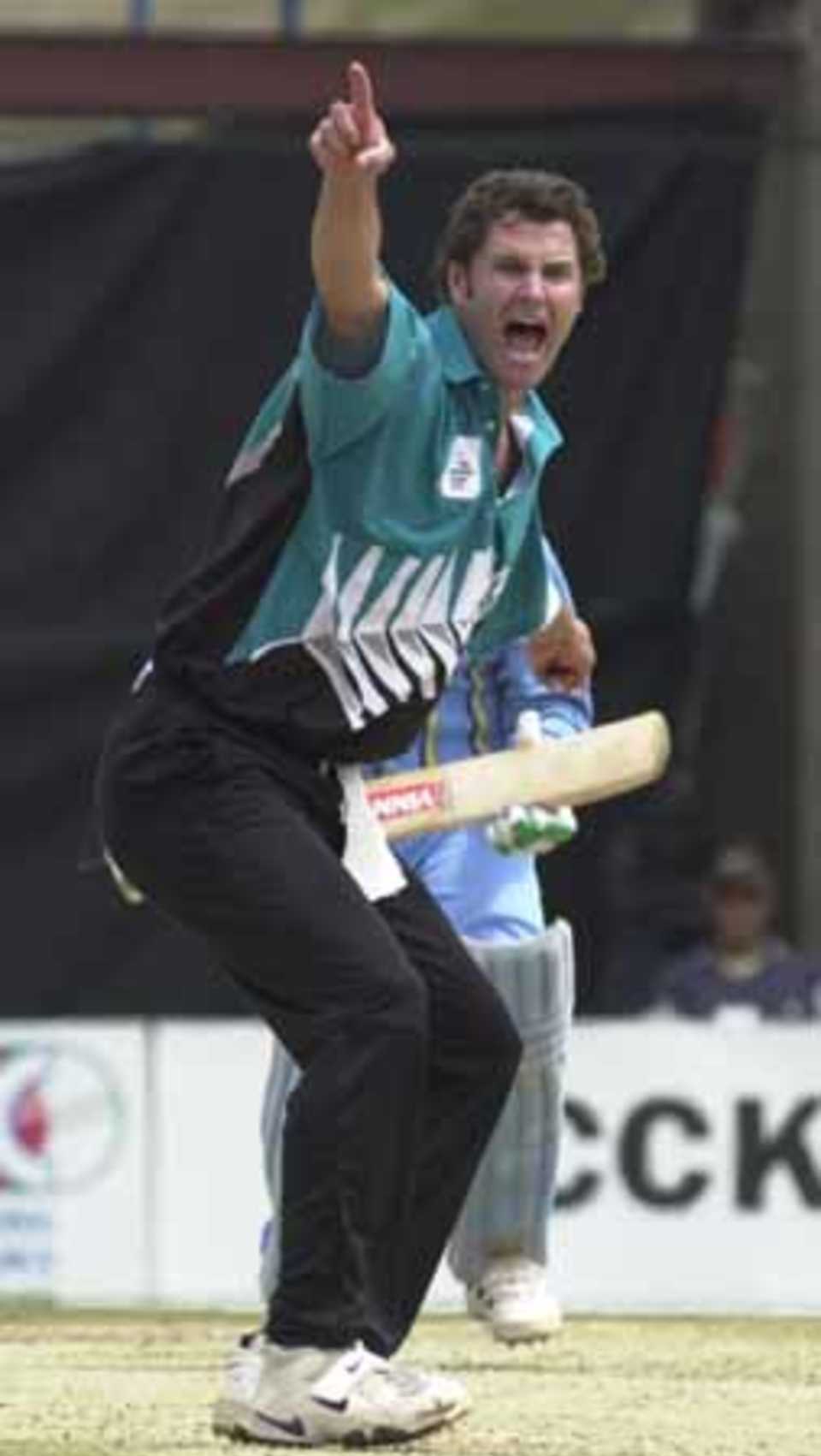 Chris Cairns lets out an appeal against Ganguly in the final