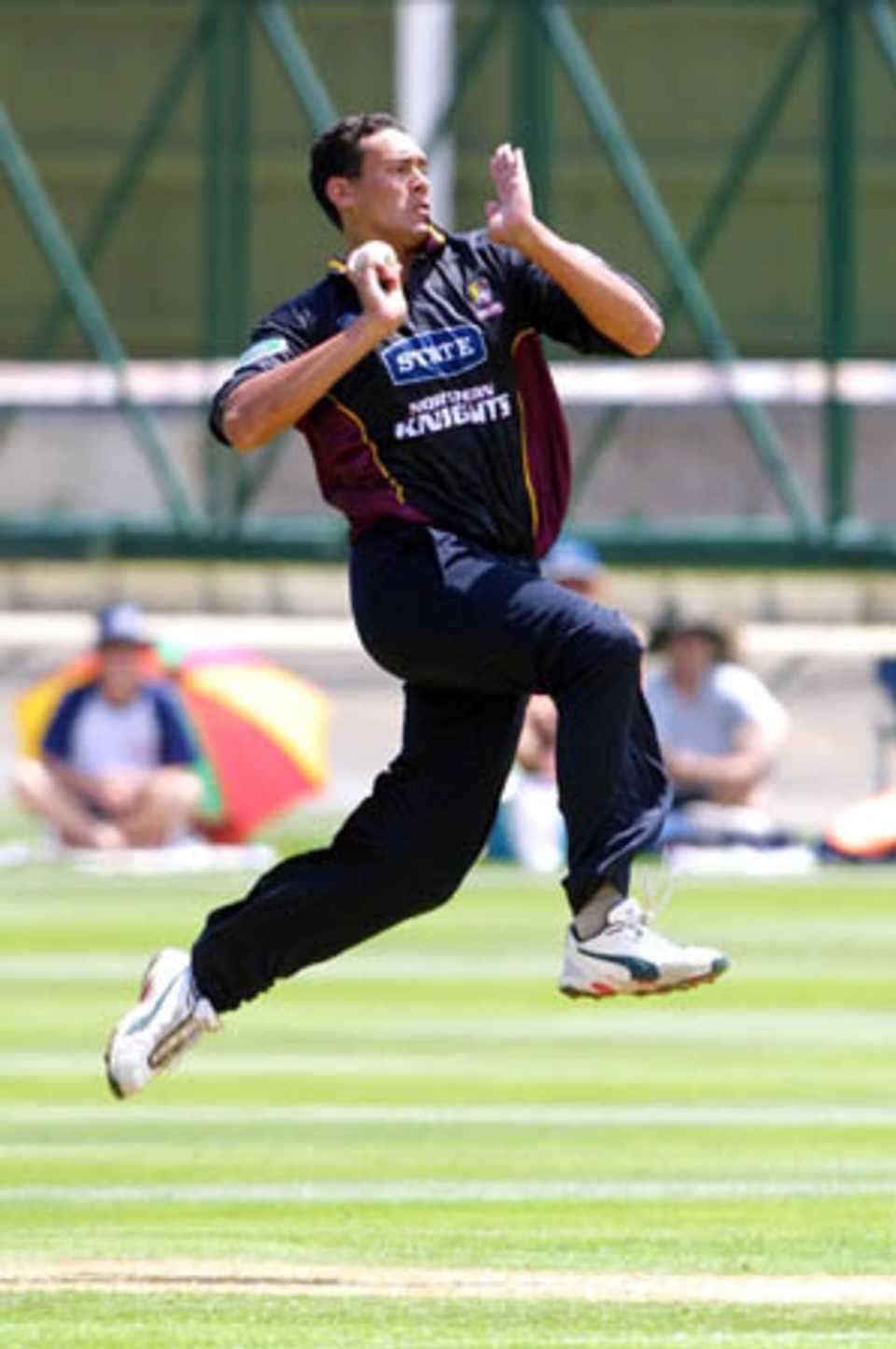 Northern Districts bowler Daryl Tuffey delivers a ball during his spell of 2-43 from seven overs. State Shield: Auckland v Northern Districts at Eden Park Outer Oval, Auckland, 2 Jan 2002 (2 January 2002).