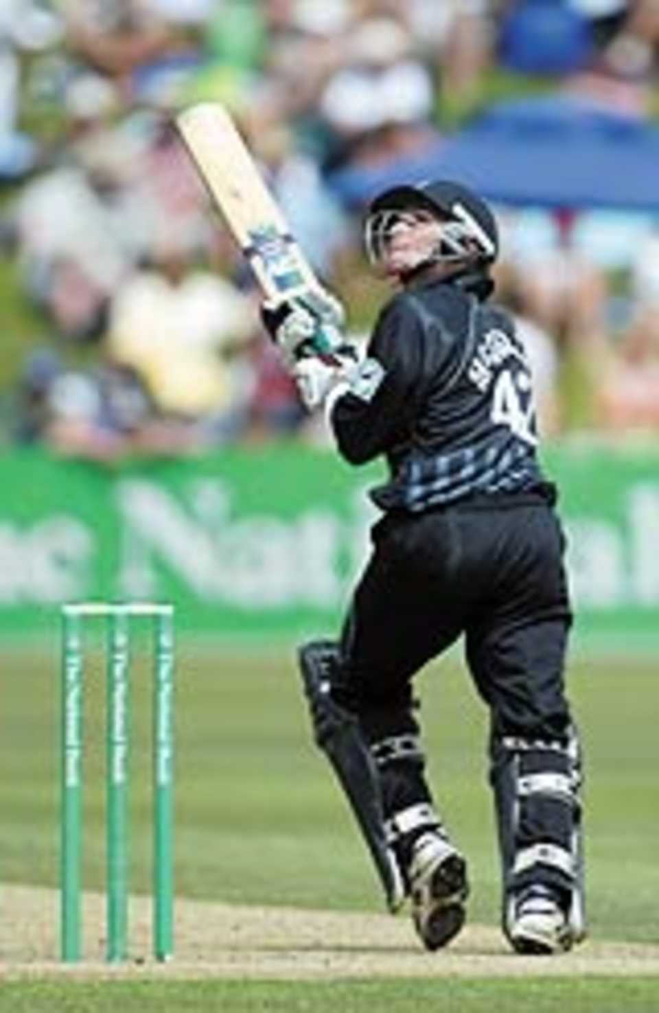Brendon McCullum scoops the ball to the fine leg fence