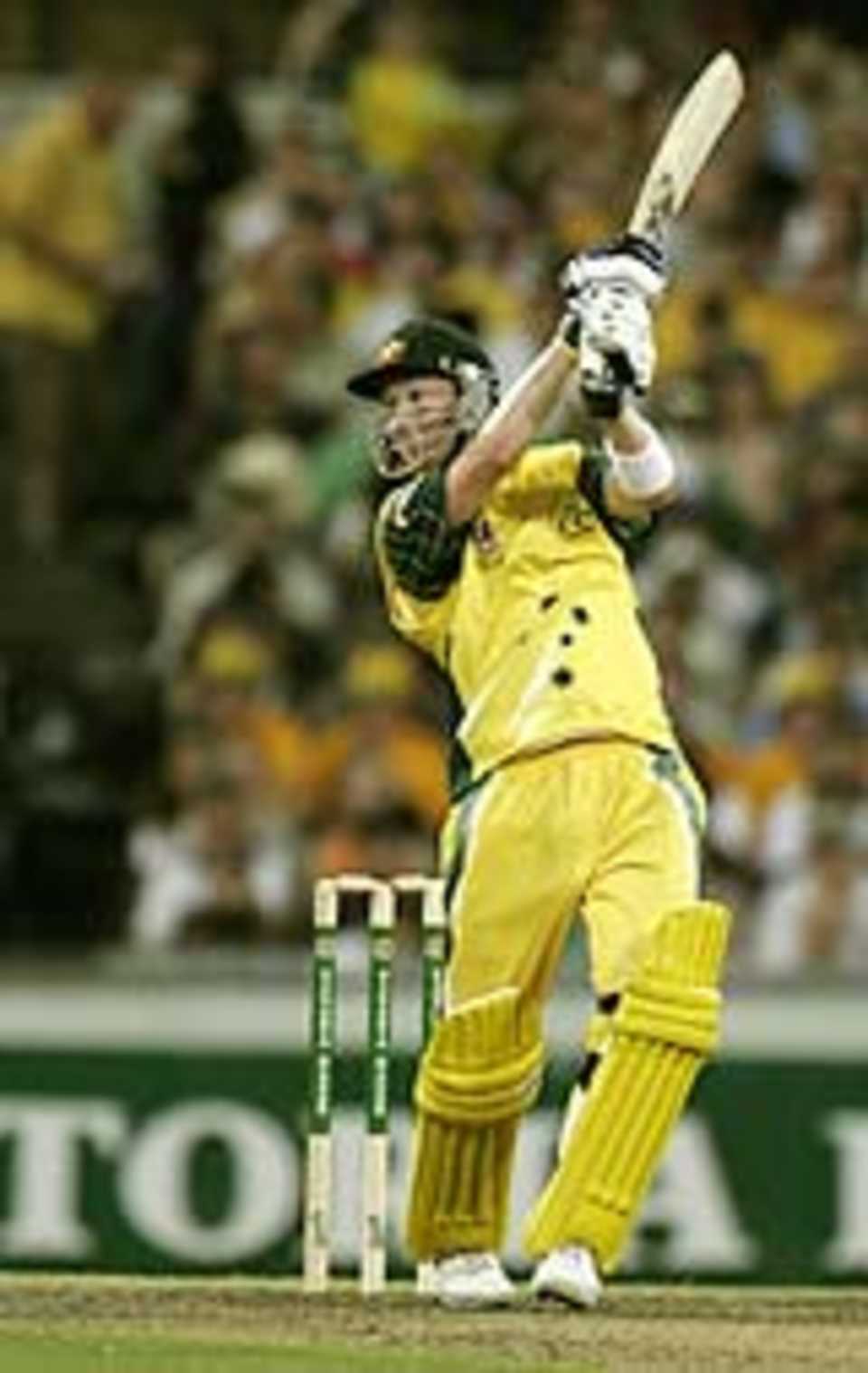 Michael Clarke drives to the off side