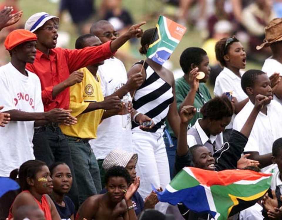 South African fans cheer local hero Monde Zondeki as he takes a wicket