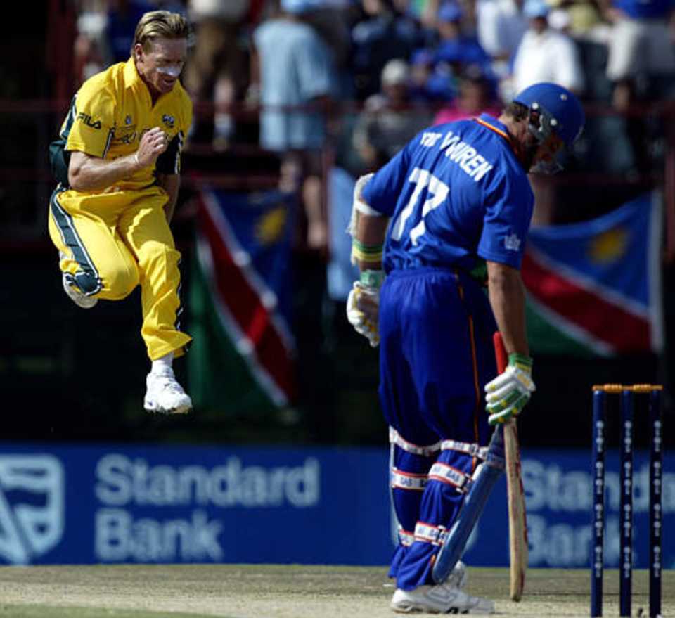 Bichel jumps in the air as he celebrates taking the wicket of Van Vuuren