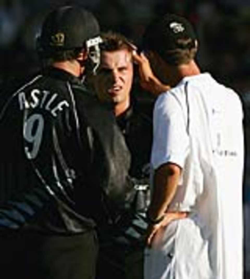 Michael Papps receives treatment after being struck by Brett Lee