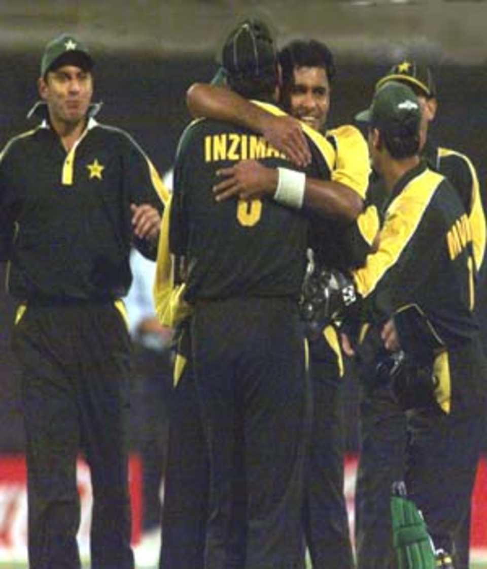 Waqar Younis celebrates after getting rid of a South African batsmen, Pakistan v South Africa, Coca-Cola Cup 1999/00, C.A. Stadium Sharjah, 24 March 2000.