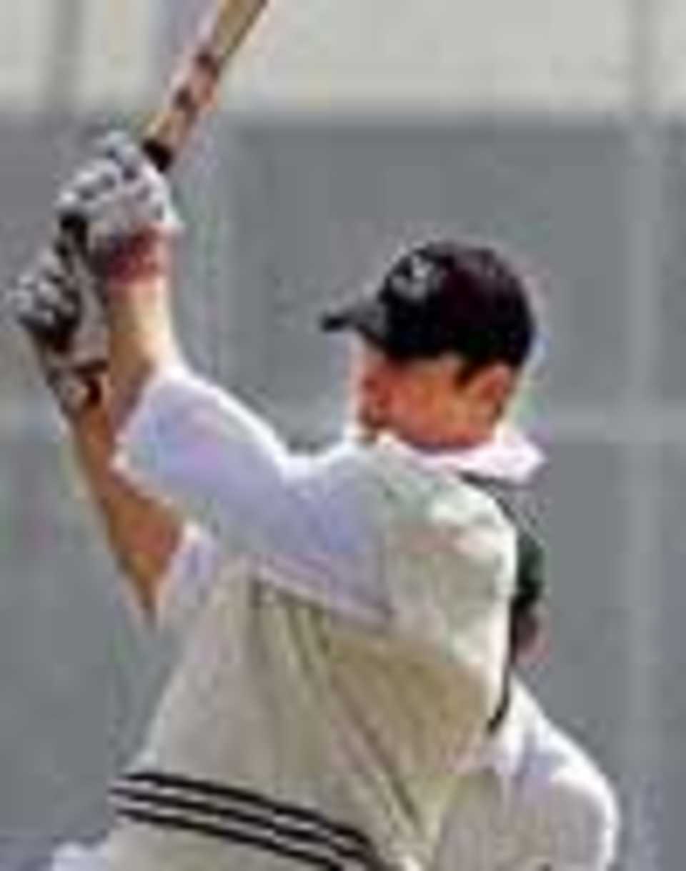 Jacob Oram of New Zealand B powers his way to 88 in the New Zealand first innings: thumbnail