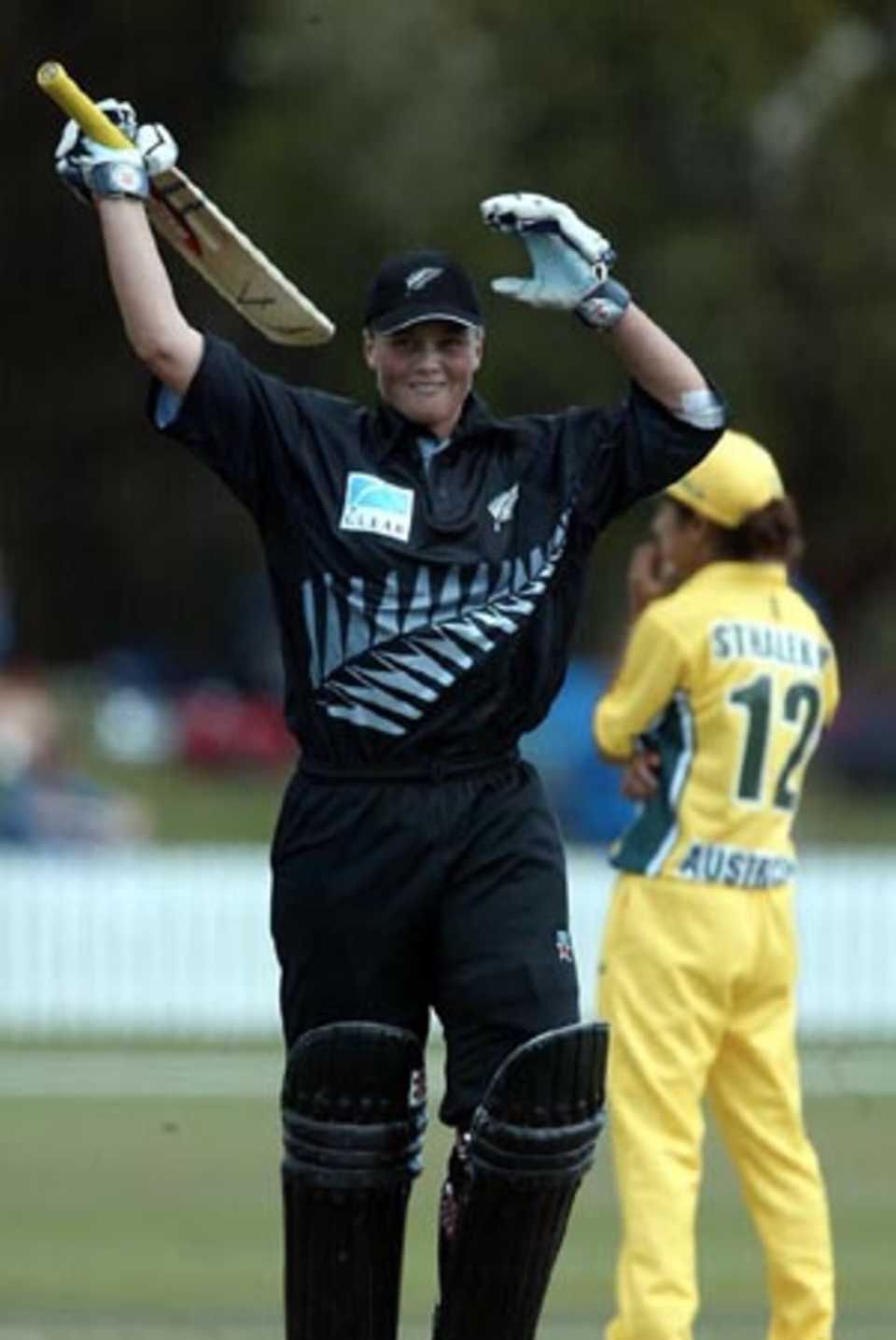 New Zealand Women batsman Rebecca Rolls celebrates reaching her century. Rolls went on to score 114. 3rd WODI: New Zealand Women v Australia Women at Bert Sutcliffe Oval, Lincoln, 6 March 2002.