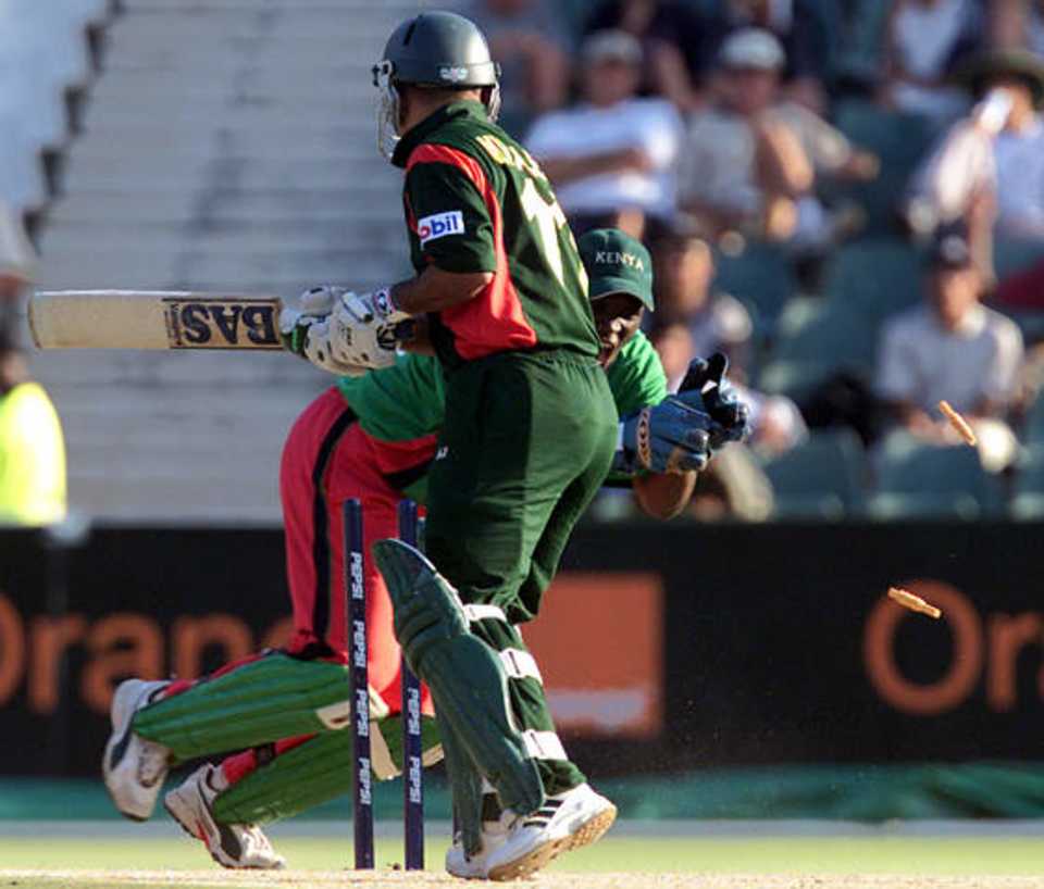 The bails fly off the stumps as Bangladesh batsman Khaled Mashud is bowled for 41 runs
