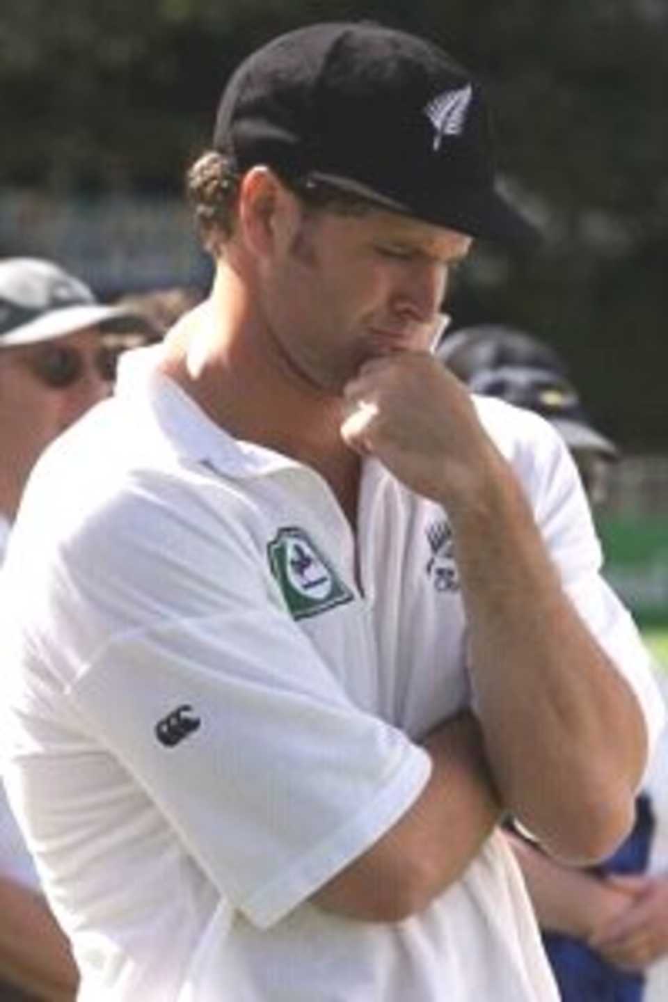 03 Apr 2000: Chris Cairns of New Zealand contemplates his teams loss in the after match presentations, during day four of the third test between New Zealand and Australia, at WestpacTrust Park, Hamilton, New Zealand. Australia won by six wickets, to win the series 3-0.