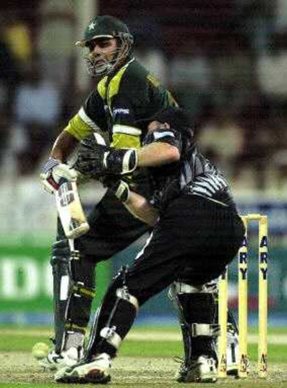 Inzamam-ul-Haq hits a boundary off Brooke Walker during his unbeaten 85, ODI5 at Sharjah, New Zealand v Pakistan, 15 April 2001