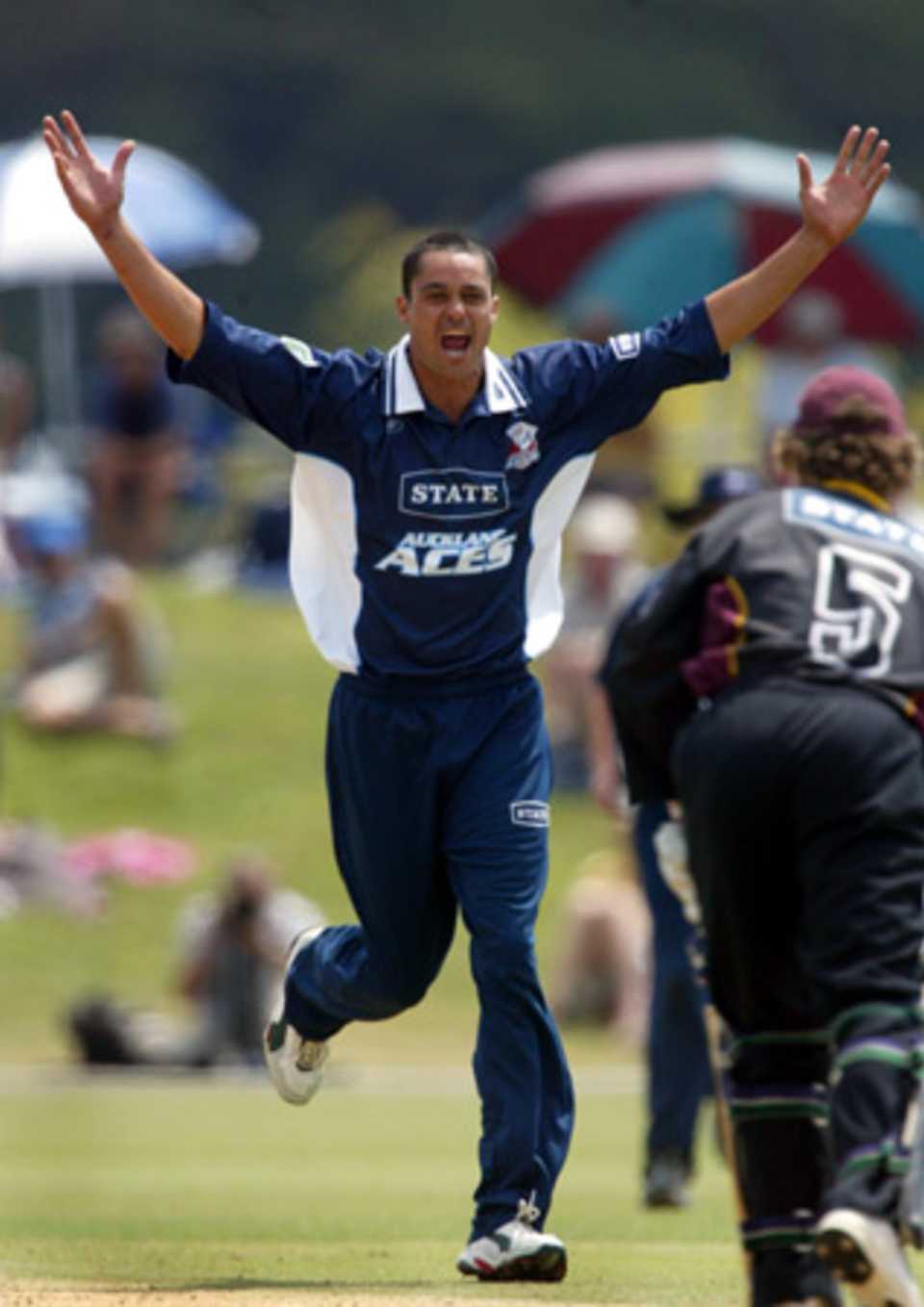 Canning celebrates the dismissal of James Marshall. State Shield Final: Auckland v Northern Districts at Auckland, 1 Feb 2003