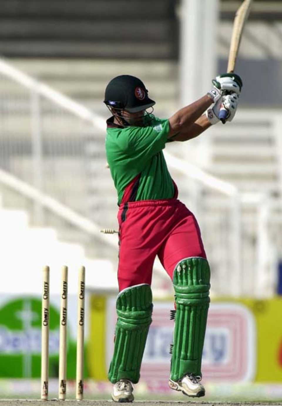 Kenyan batsman Brijal Patel loses his wicket off Zimbabwe pacer Douglas Hondo