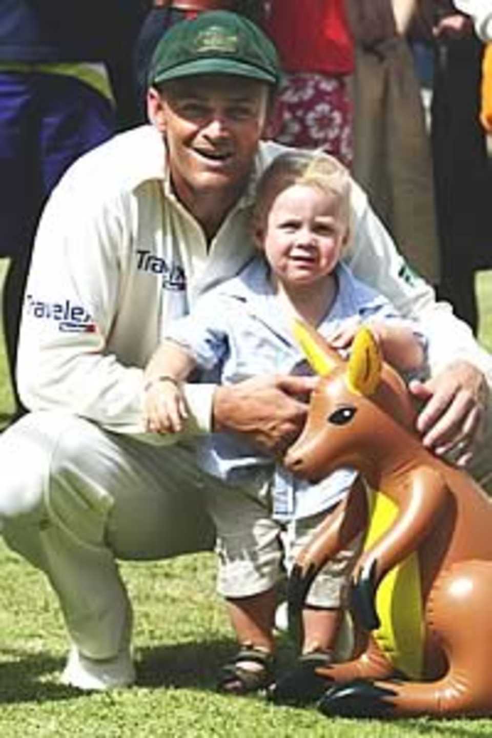 BRIDGETOWN, BARBADOS - MAY 5: Adam Gilchrist of Australia with son Harrison after day five of the Third Test between the West Indies and Australia on May 5, 2003 at Kensington Oval in Bridgetown, Barbados.