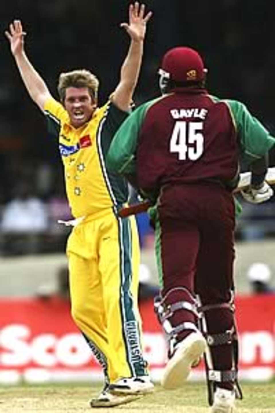 PORT OF SPAIN, TRINIDAD - MAY 24: Ian Harvey of Australia traps Chris Gayle of the West Indies LBW during the 4th One Day International between the West Indies and Australia on May 24, 2003 at Queens Park Oval in Port of Spain, Trinidad.