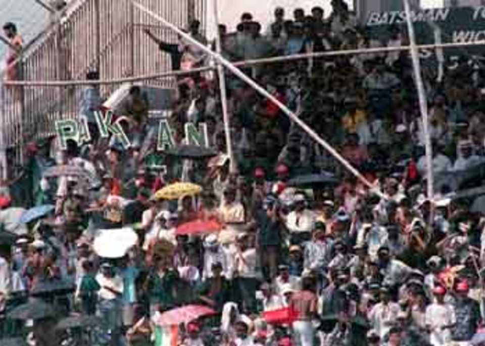 Part of the record crowd at Dhaka's Bangabandhu National Stadium during the India-Pakistan match. A superb Pakistani attack on India thrilled the cricket-crazy crowd at the four-nation Asia Cup limited-overs tournament in Dhaka. Asia Cup, 1999/00, 5th Match, India v Pakistan, Bangabandhu National Stadium, Dhaka, 3 June 2000.