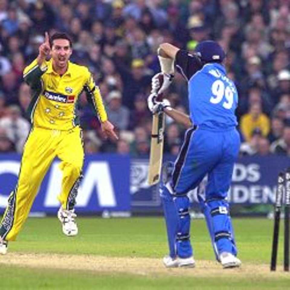 14 Jun 2001: Jason Gillespie of Australia celebrates taking the wicket of Michael Vaughan of England during the England v Australia NatWest One Day match at Old Trafford, Manchester