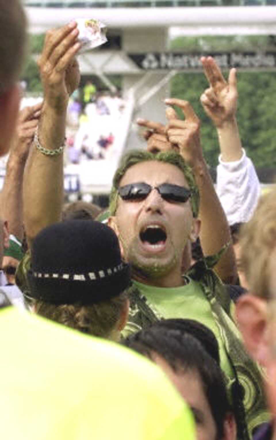 A Pakistani fan waves money to show his disapproval,  final ODI at Lords, 23 June 2001