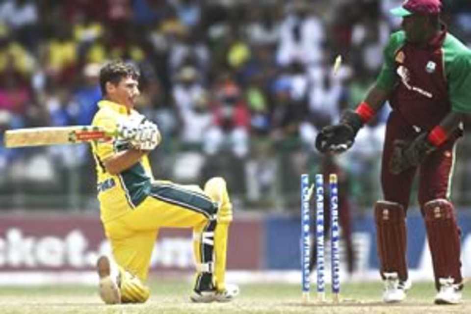 ST GEORGE'S, GRENADA - JUNE 1: Brad Hogg of Australia is bowled during the seventh One Day International between the West Indies and Australia on June 1, 2003 played at Queen's Park Stadium in St George's, Grenada