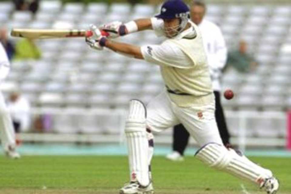 8 Jul 2000: Darren Lehmann of Yorkshire hits the shot which is caught by Nick Phillips of Durham in the PPP healthcare County Championship match at Headingley. Lehmann was out for 28 runs, leaving his side chasing 314.