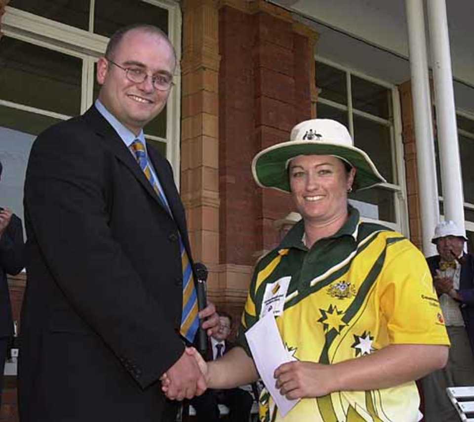 Karen Rolton receives her CricInfo Player of the Series  award from Andrew Hall of CricInfo