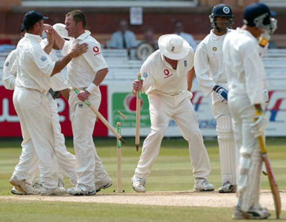 England players celebrate after sealing a convincing win over India