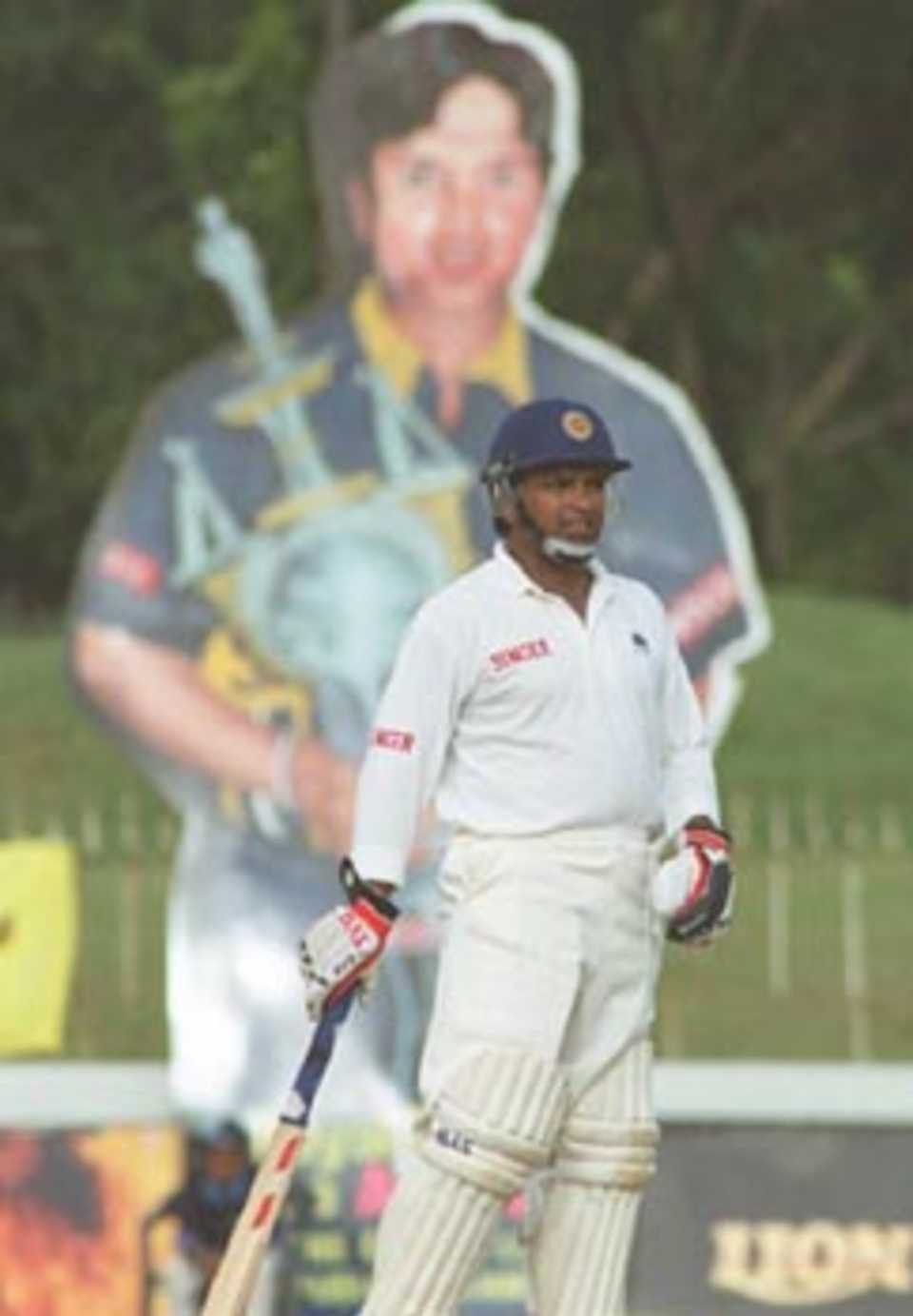 While playing his last Test innings Ranatunga inadvertently poses in front of a huge hoarding of himself. South Africa in Sri Lanka 2000/01, 3rd Test, Sri Lanka v South Africa, Sinhalese Sports Club Ground, Colombo,06-10 August 2000 (Day 5).