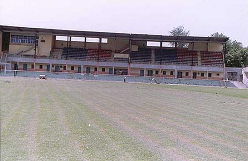 The groundsmen at work on the turf at the KD Singh Babu Stadium