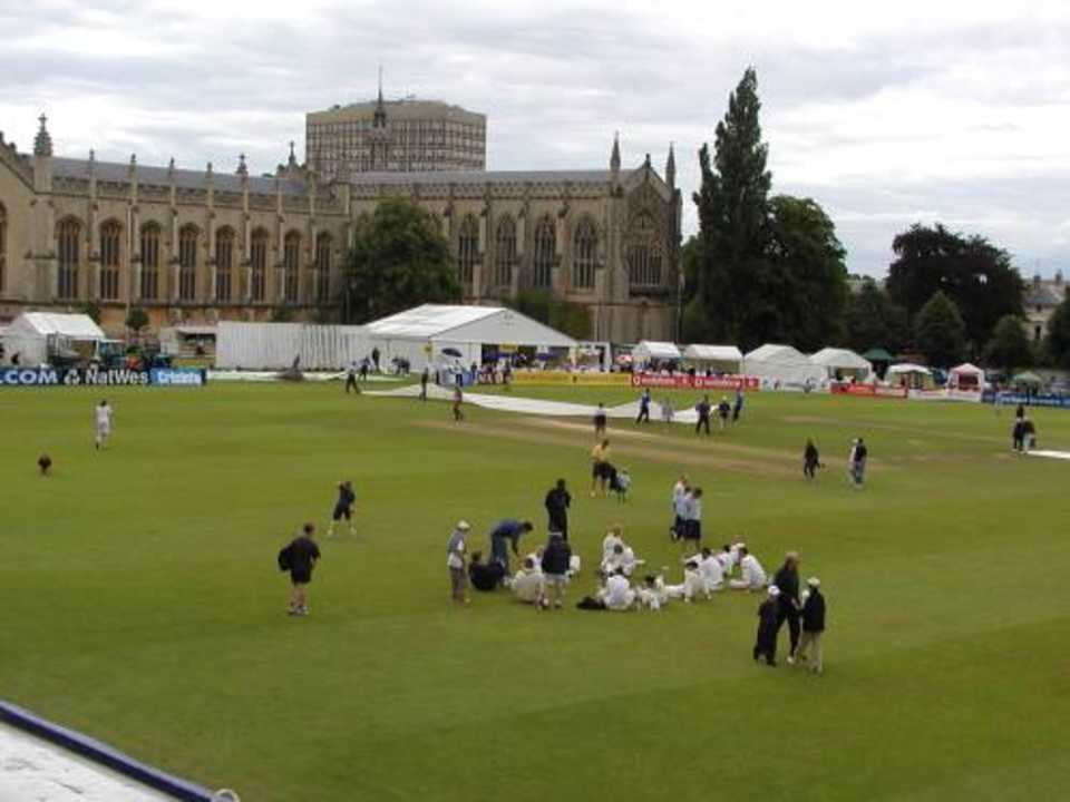 The Hampshire team relax after a day in the field at the pretty Cheltenham College Ground