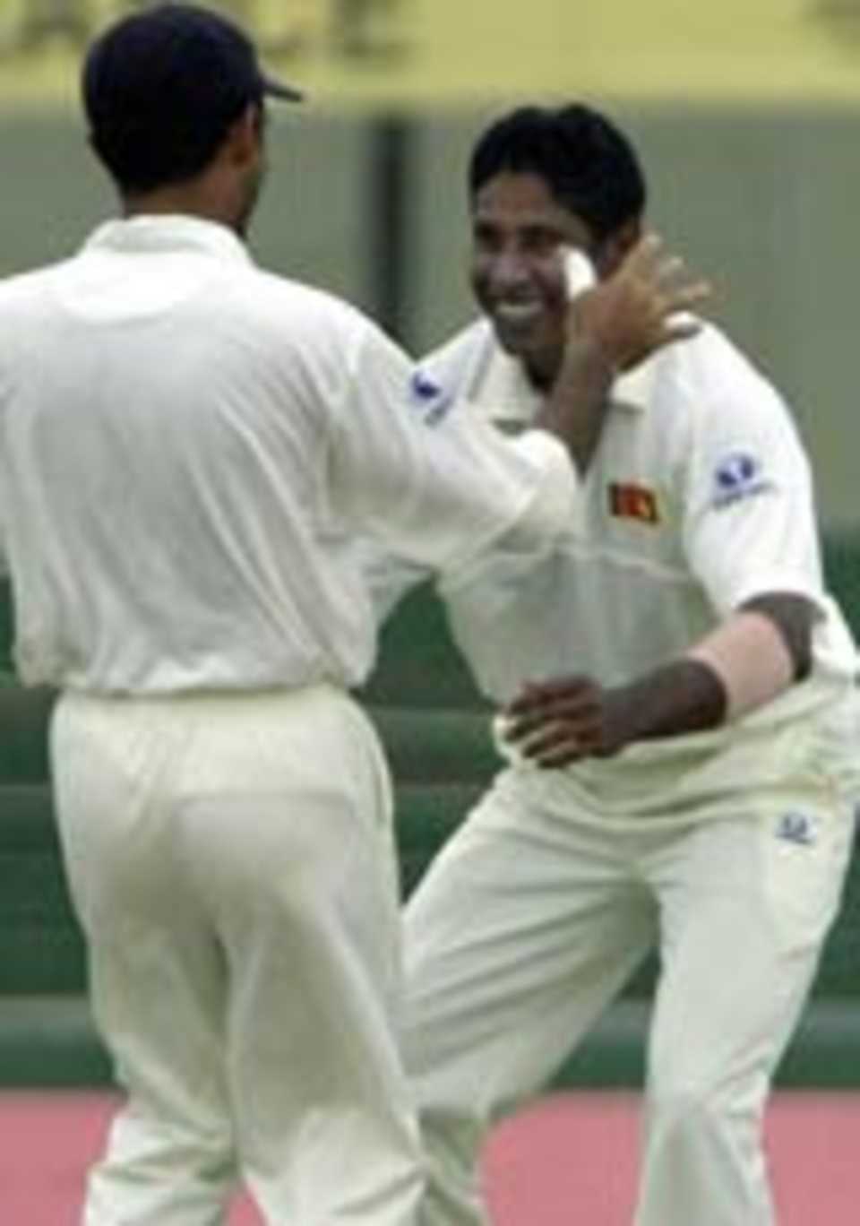 Chaminda Vaas and Marvan Atapattu are ecstatic as South Africa lose another wicket, Sri Lanka v South Africa, 2nd Test, 4th day, Colombo, August 14, 2004