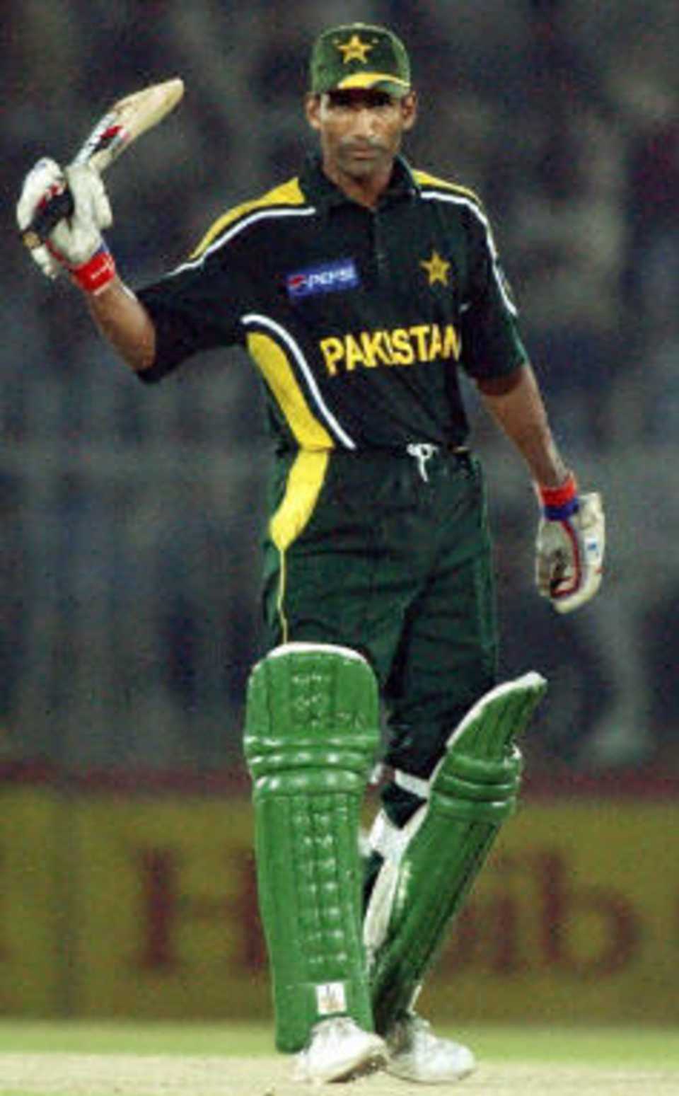 Yousuf Youhana acknowledges his half century, Pakistan v Bangladesh, 4th ODI, Rawalpindi, September 18, 2003.
